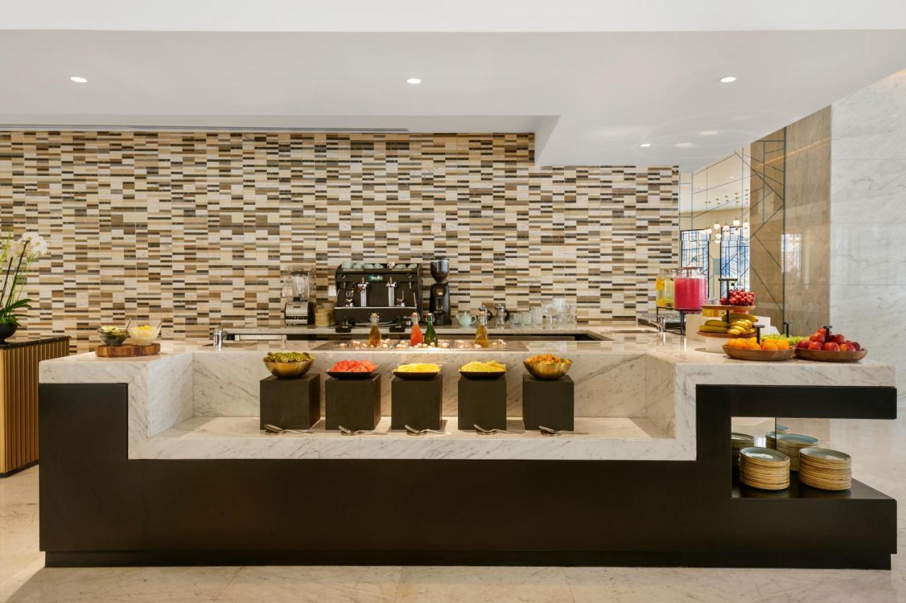 Wyndham Grand Doha West Bay Beach Eksteriør bilde The Coffee Shop